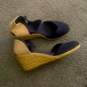Blue shoes with a wedge heel. Size 7.